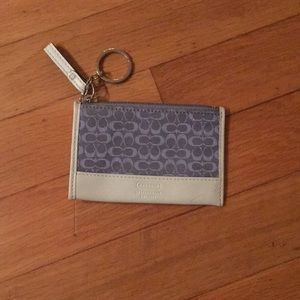 Coach change holder